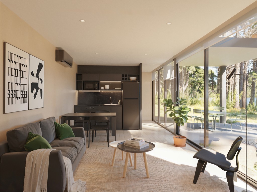 Living del alojamiento con vista al bosque